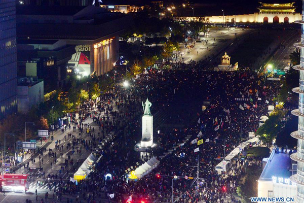 South Korean prosecutors arrest woman at centre of political crisis: media