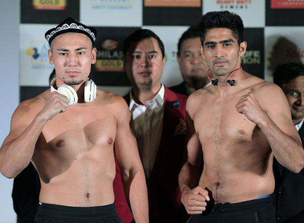 Indian boxer offers championship belt to Chinese rival as gesture of peace