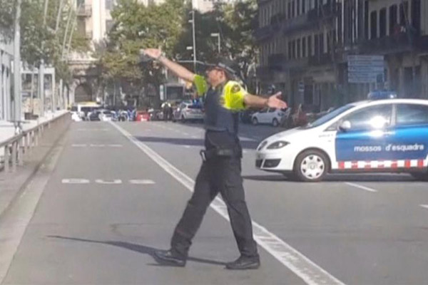 Barcelona in lockdown as police search for terrorists