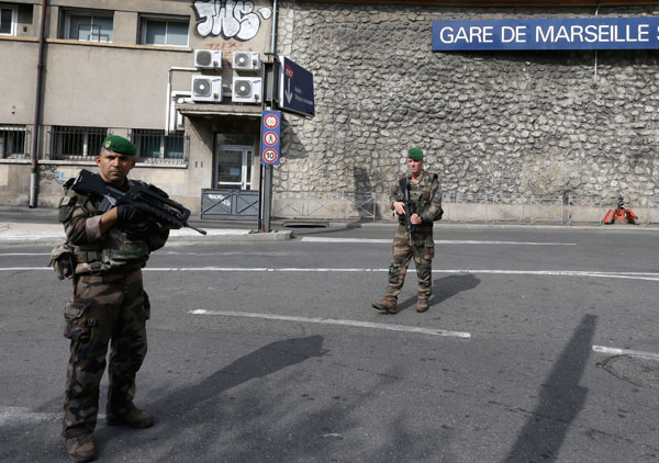 Man kills two people at French train station before being shot dead