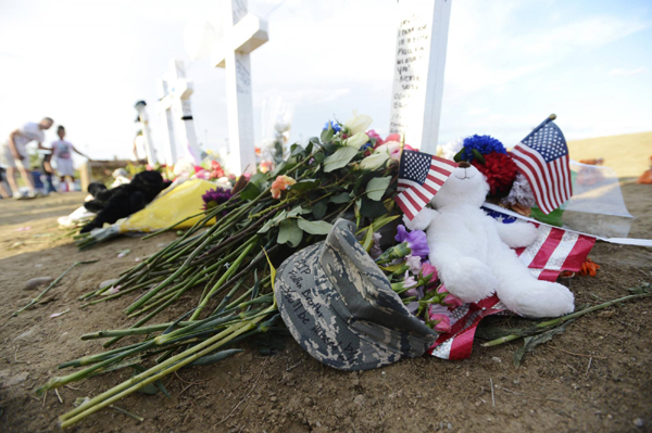 Denver residents mourn shooting victims