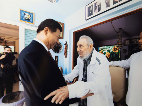 Xi visits old friend Fidel Castro at home