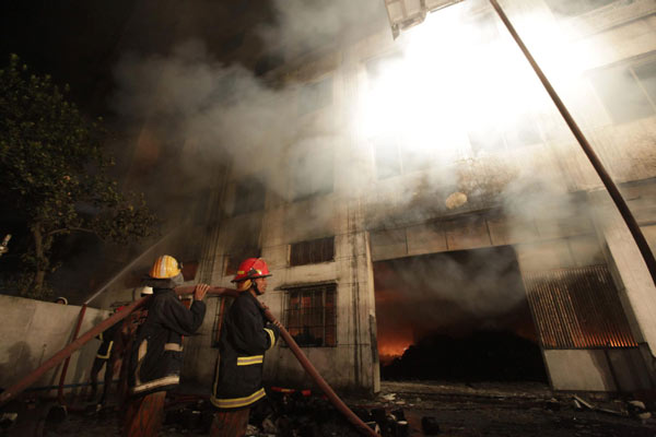 Bangladesh garment factory fire kills more than 100