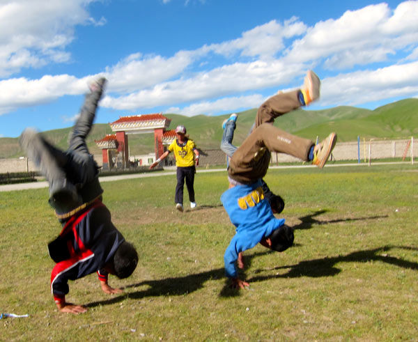 Kicking it with Yushu's yak-herding b-boys