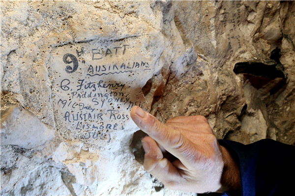 In cave graffiti near battle of the somme site, soldiers live on