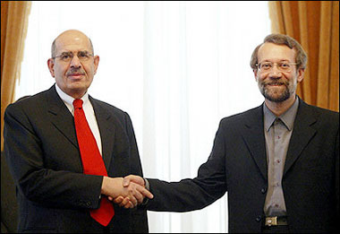 Head of the UN atomic watchdog Mohamed ElBaradei(L) shakes hands with Iran's Chief Nuclear Negotiatior, Ali Larijani, during their meeting in Tehran. Iran's hardline regime dismissed appeals from ElBaradei to freeze its controversial nuclear program and calm suspicions it is seeking the bomb.(AFP