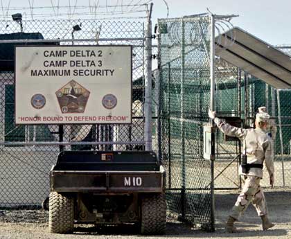 In this photo, reviewed by US military officials, the gate is closed to the maximum security prison at Camp Delta 2 & 3, at the Guantanamo Bay U.S. Naval Base, Cuba, April 5, 2006. Also at Guantanamo Wednesday, shouting punctuated a military hearing, closed off to cameras, for a Canadian detainee accused of killing an