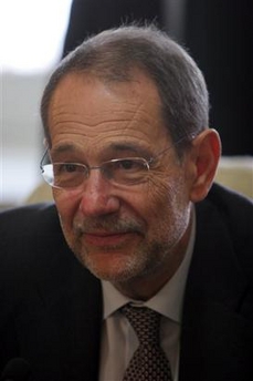 EU foreign policy chief Javier Solana listens to the Iranian Foreign Minister, Manouchehr Mottaki, unseen, during their meeting in Tehran, Iran, Tuesday, June 6, 2006. The incentives designed to persuade Iran to curb its nuclear program contain 'positive steps' and 'ambiguities,' Iran's top nuclear negotiator said Tuesday. [AP]