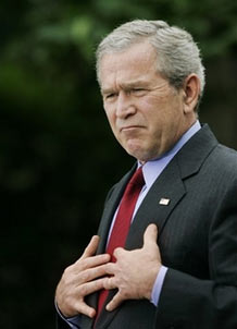 US President Bush, gestures during a news conference in the Rose Garden at the White House, Wednesday, June 14, 2006, in Washington. President Bush, freshly home from a visit to Iraq, acknowledged on Wednesday that violence in Iraq would never be completely eliminated. [AP Photo]
