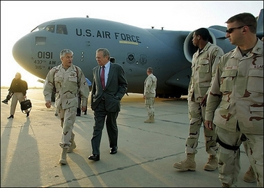 US Defense Secretary Donal Rumsfeld (C) and US Army General George Casey (2nd L) seen here at Baghgad International Airport in April 2006. Rumsfeld is set to meet with the top American military commander in Iraq here for two days of talks, starting Wednesday, that are expected to review prospects for US troop reductions this year.(