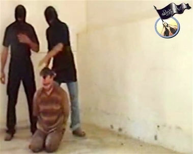 In this image made from a Web video taken at an unknown location, two masked men prepare to apparently kill a kneeling blindfolded employee of the Russian embassy in Iraq . The identity of the man cannot be accurately discerned. An al-Qaida-linked group posted the Web video Sunday June 25, 2006, showing the killings of three Russian embassy workers abducted earlier this month in Iraq. A fourth also was said to have been killed. Footage of the men speaking into the camera is dated June 13, but the footage of the killings is undated. Arabic script on al-Qaida emblem at top right reads: 'There is no god except Allah.' (AP Photo), China Daily