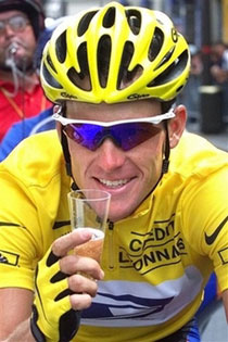 In this July 23, 2000, file photo, seven-time Tour de France winner Lance Armstrong enjoys a glass of champagne near the end of another victory. A new but unproven theory says body heat might explain Armstrong's astounding triumph over testicular cancer. (AP Photo