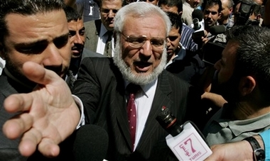 Palestinian Parliament speaker Abdel Aziz Duaik arrives at the Palestinian Legislative Council in the West Bank town of Ramallah, in this Monday, July 3, 2006 file photo. Israeli forces arrested Duaik at his house early Sunday, Aug. 5, 2006, Palestinian officials said. 
