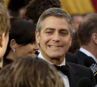 George Clooney arrives for the 78th Academy Awards in this March file photo in Los Angeles. (AP Photo/Chris Pizzello, FILE) 