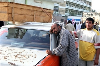 Relative of police recruit killed in an ambush near Baqouba Sunday cries after collecting remains in front of Imam Ali hospital in Baghdad's Shiite enclave of Sadr City, Monday Oct. 23, 2006. Gunmen in five sedans ambushed a convoy of buses carrying police recruits near the city of Baqouba 35 miles (55 kilometers) northeast of Baghdad, killing at least 15 and wounding 25 others. (AP