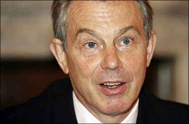 British Prime Minister Tony Blair is pictured as he prepares to meet school pupils representing the 'Stop Climate Chaos Coalition' in 10 Downing Street in London. A probe into damaging cash-for-honours charges closed in on Blair, as it emerged that police had contacted every member of his cabinet except the Labour leader over the affair.(AFP