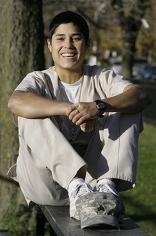 Army veteran Alicia Flores, 23, who served in Iraq, poses near her South Side Chicago home Nov. 1, 2006. Flores had nightmares and sleepless nights months after returning from Iraq. She now has signed up with Army Reserve and is considering a military career. (AP 