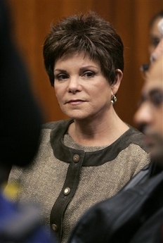 Former Hewlett-Packard Co. Chairwoman Patricia Dunn sits in a courtroom Wednesday, Nov. 15, 2006, in Santa Clara County Superior Court in San Jose, Calif. Hewlett-Packard Co. agreed Thursday, Dec. 7, 2006, to pay $14.5 million to settle a lawsuit brought by state Attorney General Bill Lockyer accusing the company of unfair business practices in its crusade to unmask the source of boardroom leaks to the news media. The vast majority of the settlement, $13.5 million, will fund state and local investigations into privacy rights and intellectual property violations, Lockyer said in a statement as the lawsuit and settlement were filed in Santa Clara County Superior Court. (AP