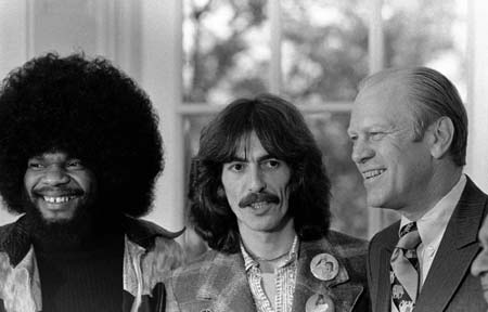 Former U.S. President Gerald Ford (R) is pictured with George Harrison (C) and Billy Preston (L) in the Oval Office in this December 13, 1974 file photo. Ford, 93, has died, according to a statement from his wife Bette on December 26, 2006. 