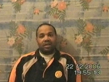 A man who identified himself as kidnapped contractor Paul Johnson Reuben from Buffalo Minnesota, is seen in this image taken from video made available to the Associated Press on Wednesday Jan. 3, 2007. [AP]