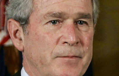 Tears run down the cheek of U.S. President George W. Bush during a ceremony in honor of Medal of Honor winner Marine Corporal Jason Dunham in the East room of the White House in Washington January 11, 2007. Corporal Dunham was killed when he jumped on a grenade to save fellow members of his Marine patrol while serving in Iraq . 