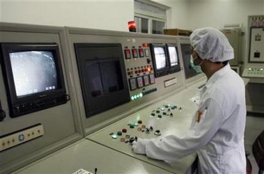 A technician works in the control room at the uranium conversion facility in Isfahan, 450 km south of Tehran, February 3, 2007.