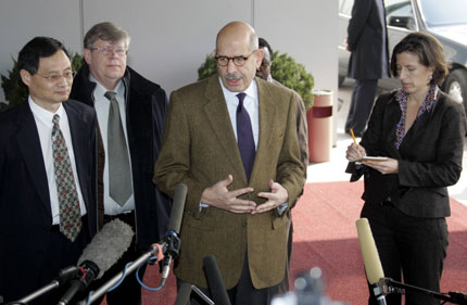 International Atomic Energy Agency (IAEA) Director General Mohamed ElBaradei (C) speaks to the media as he arrives at the Beijing airport March 12, 2007. Moving forward with a plan to inspect and close atomic facilities behind North Korea's nuclear weapons ambitions is likely to be painstaking, the chief of the U.N. nuclear watchdog said on Monday in Beijing. 
