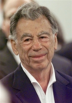 Kirk Kerkorian smiles during his appearance before the Mississippi Gaming Commission in this Thursday, May 18, 2000 file photo, in Jackson, Miss. Billionaire investor Kirk Kerkorian is proposing to pay $4.5 billion in cash for Chrysler, as parent DaimlerChrysler AG examines what to do with its troubled U.S. automaking arm.