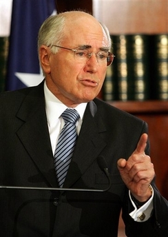 Australian Prime Minister John Howard answers a question in his Sydney offices in this April 13, 2006 file photo. 