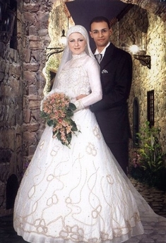 Graduate student Waleed Mohammed Shaalan, right, one of the victims of the Virginia Tech massacre, is seen with his wife Amira in this undated wedding photo. Shaalan, a native of the Nile Delta town of Zagazig, had gone to Virginia last year to study for a Ph.D. in civil engineering and was hit by three bullets, including one in the head, while in a classroom building, according to Egypt's state-run Middle East News Agency. (AP