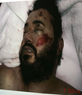 Battered al-Zarqawi photos showed, US, UK hail