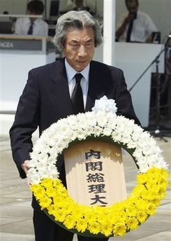 Kyodo: Japan PM says should keep Yasukuni pledge
