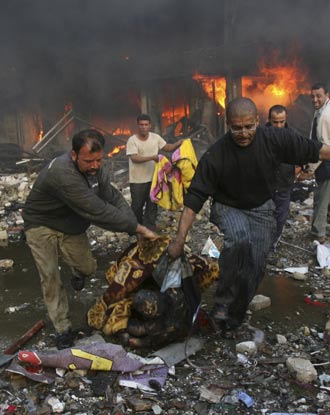 Car bombs blast Baghdad marketplace