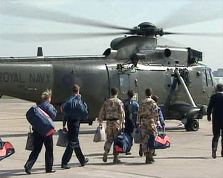 British military personnel arrive home