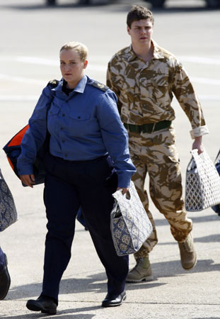 British military personnel arrive home