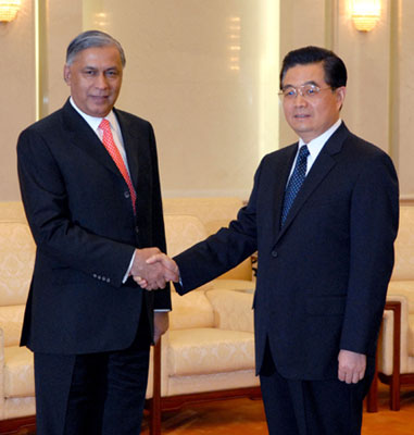 China hopes Pakistan, India improve ties