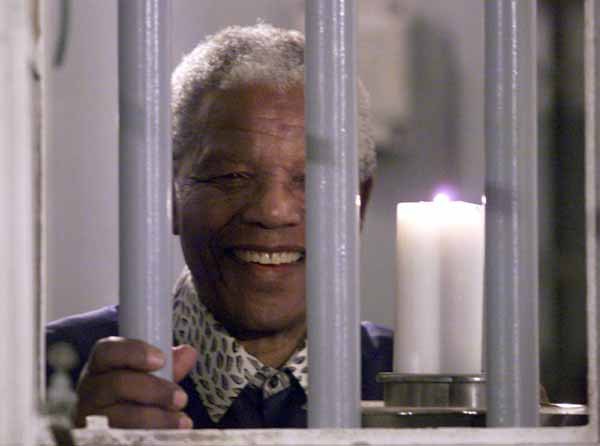 Mandela - teacher to jailmates, 'father' to jailers