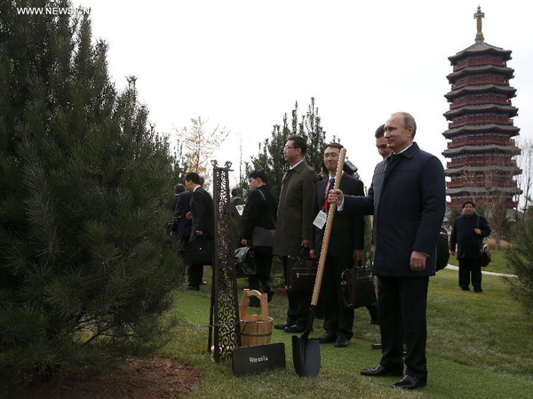 APEC leaders plant trees of friendship