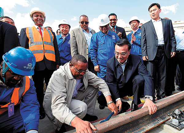 Premier Li vows industrial transfers