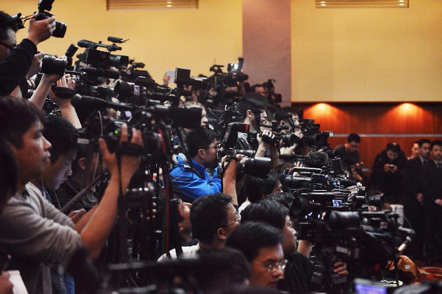 Malaysia Airlines holds press conference in Beijing on missing flight