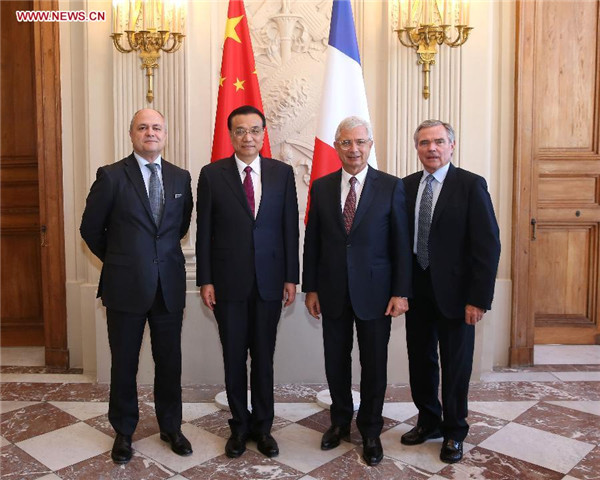 Li calls for closer parliamentary exchanges with France