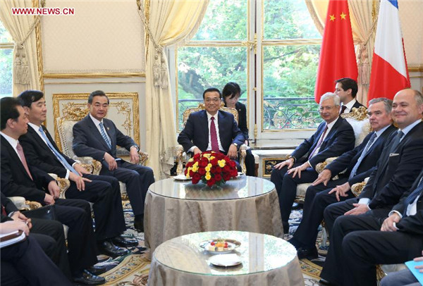 Li calls for closer parliamentary exchanges with France