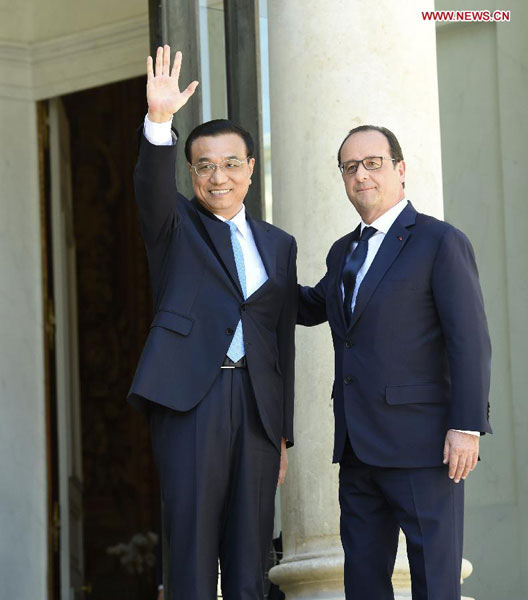 Premier Li meets French president in Paris