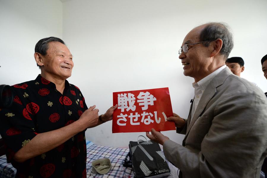 Japanese war orphan mourns adoptive parents in NE China