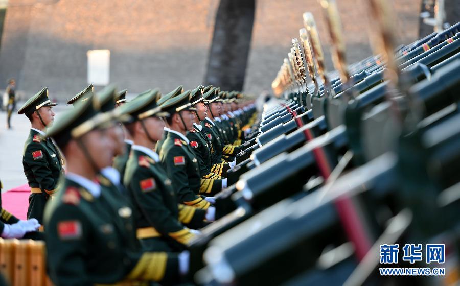 Military band performance, gun salute and flag raising