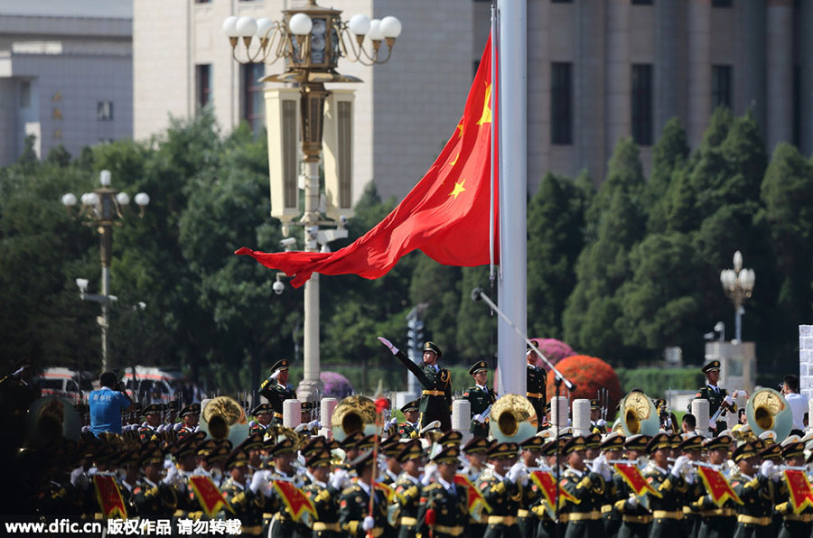 Military band performance, gun salute and flag raising