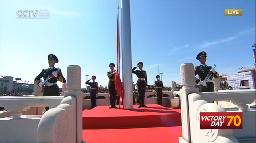 Military band performance, gun salute and flag raising