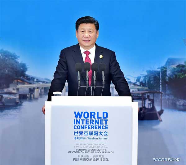 Xi slams 'double standards,' advocates shared future in cyberspace