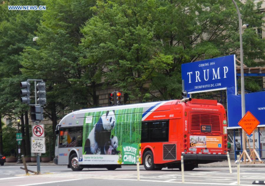 Buses with images of 6 endangered animals of China drive in US