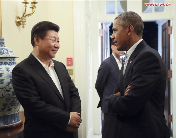 Xi, Obama go tieless to untie various issues at private dinner